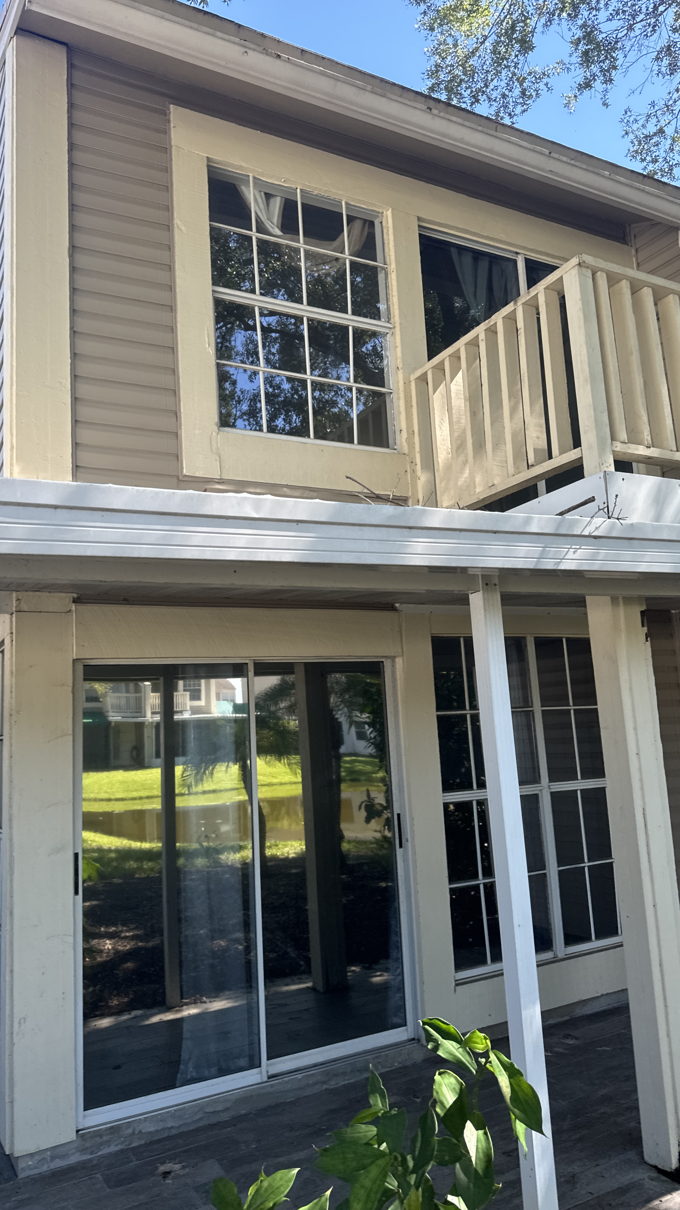 Gutter and upper exterior area in Tampa associated with gutter cleaning service