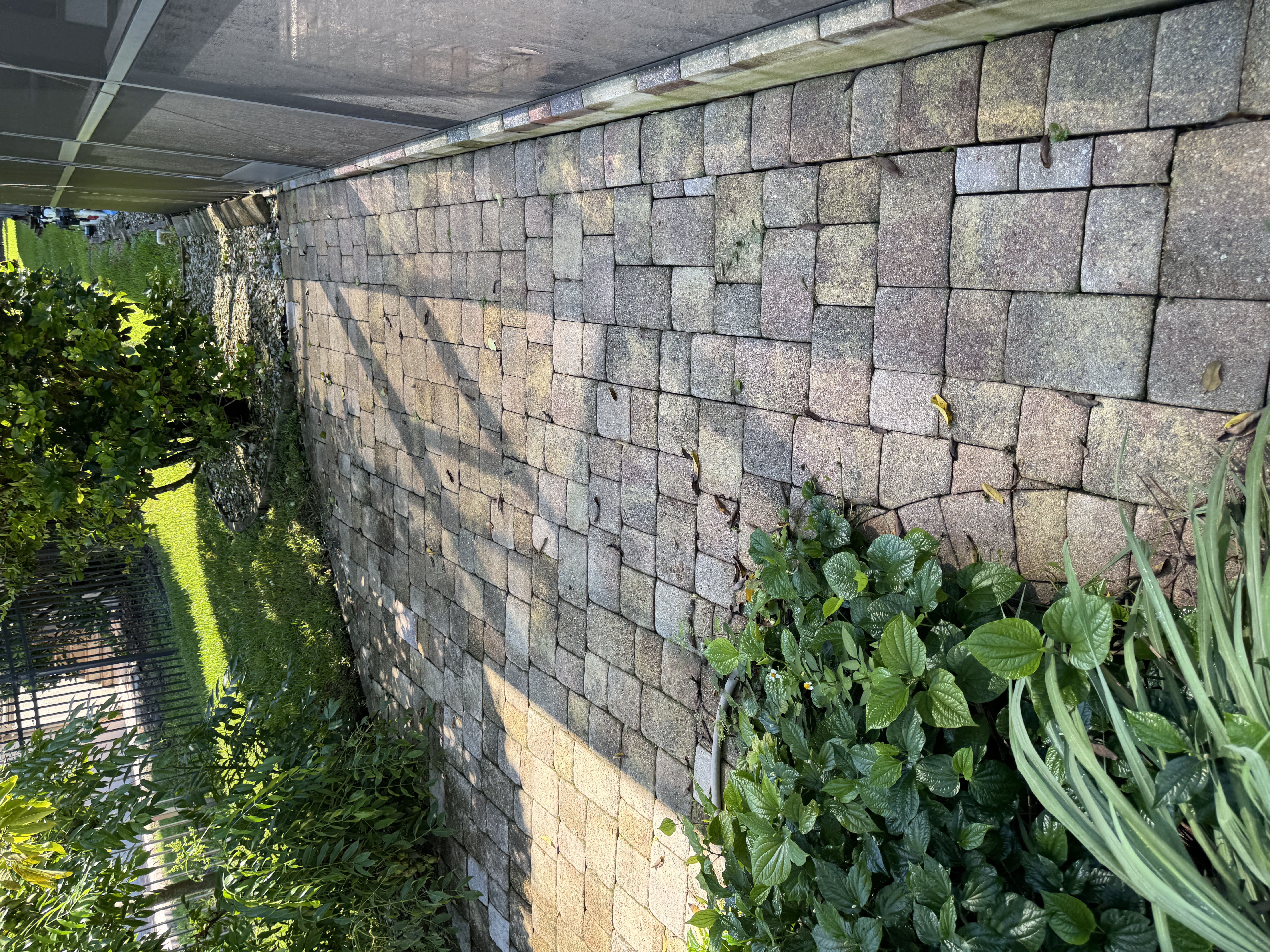 Patio cleaning example in Tampa showing a wide outdoor hardscape and entertaining area