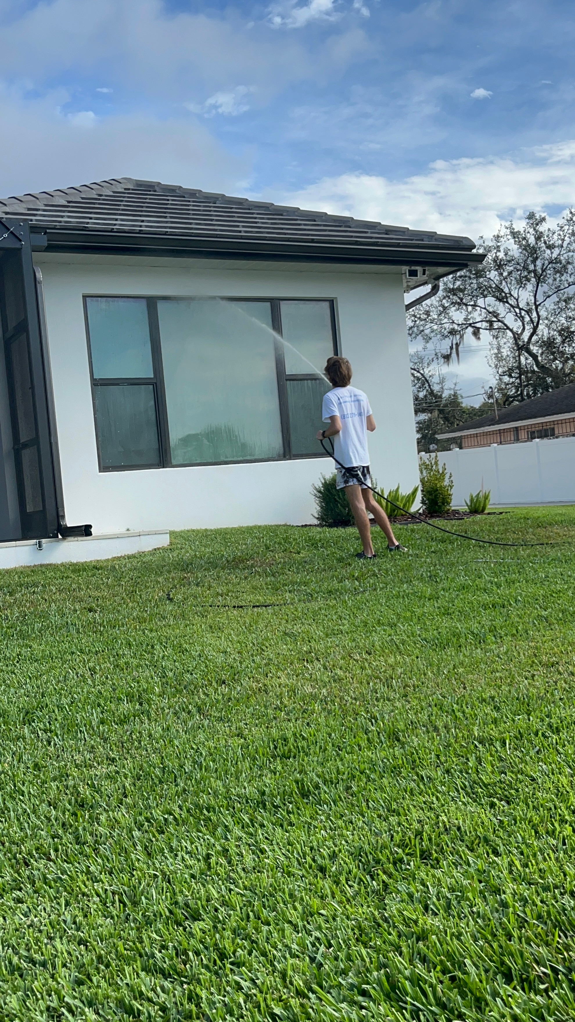 Soft washing service in Tampa on a delicate house exterior surface