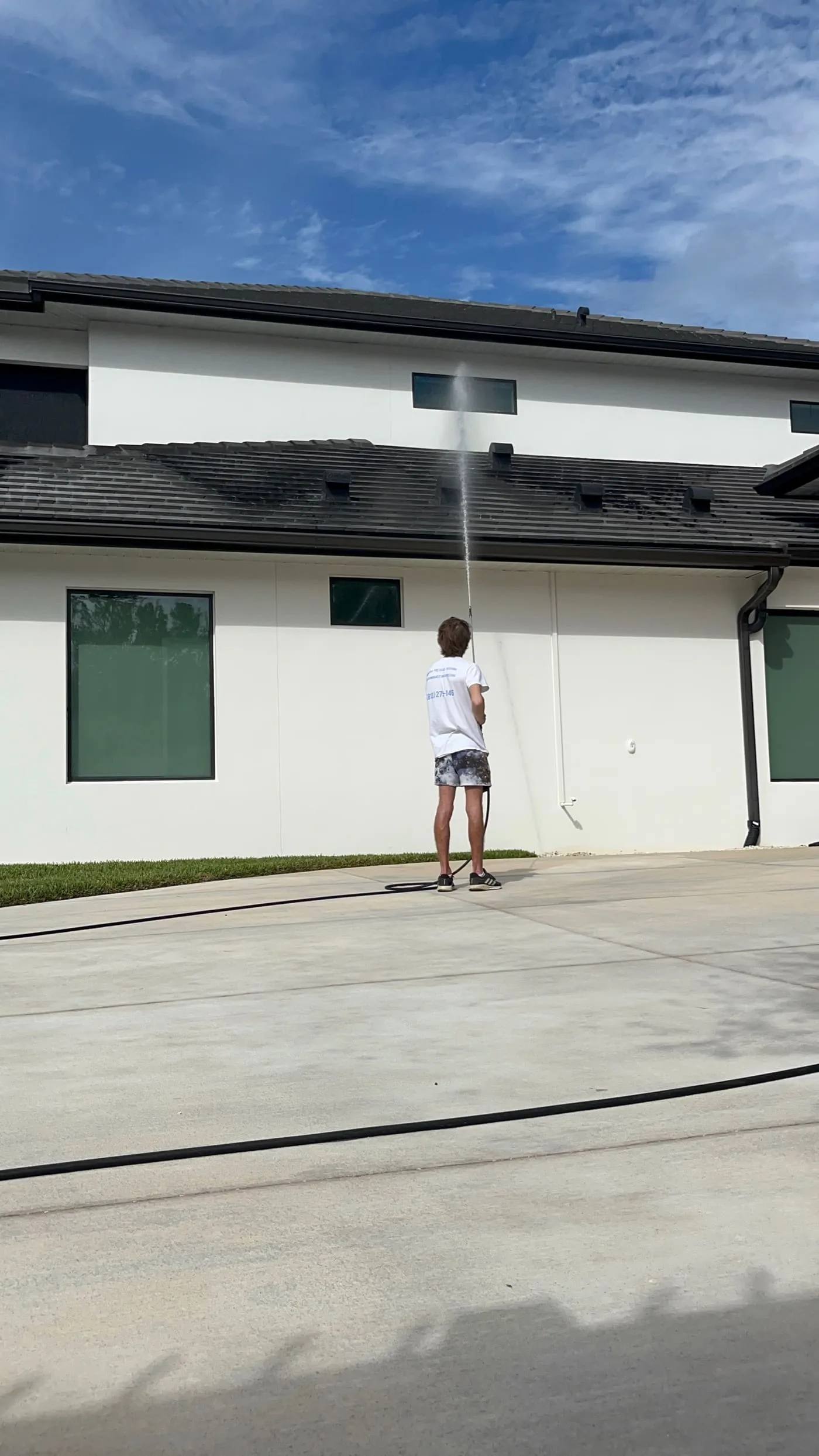 House washing service in Tampa on a residential exterior wall