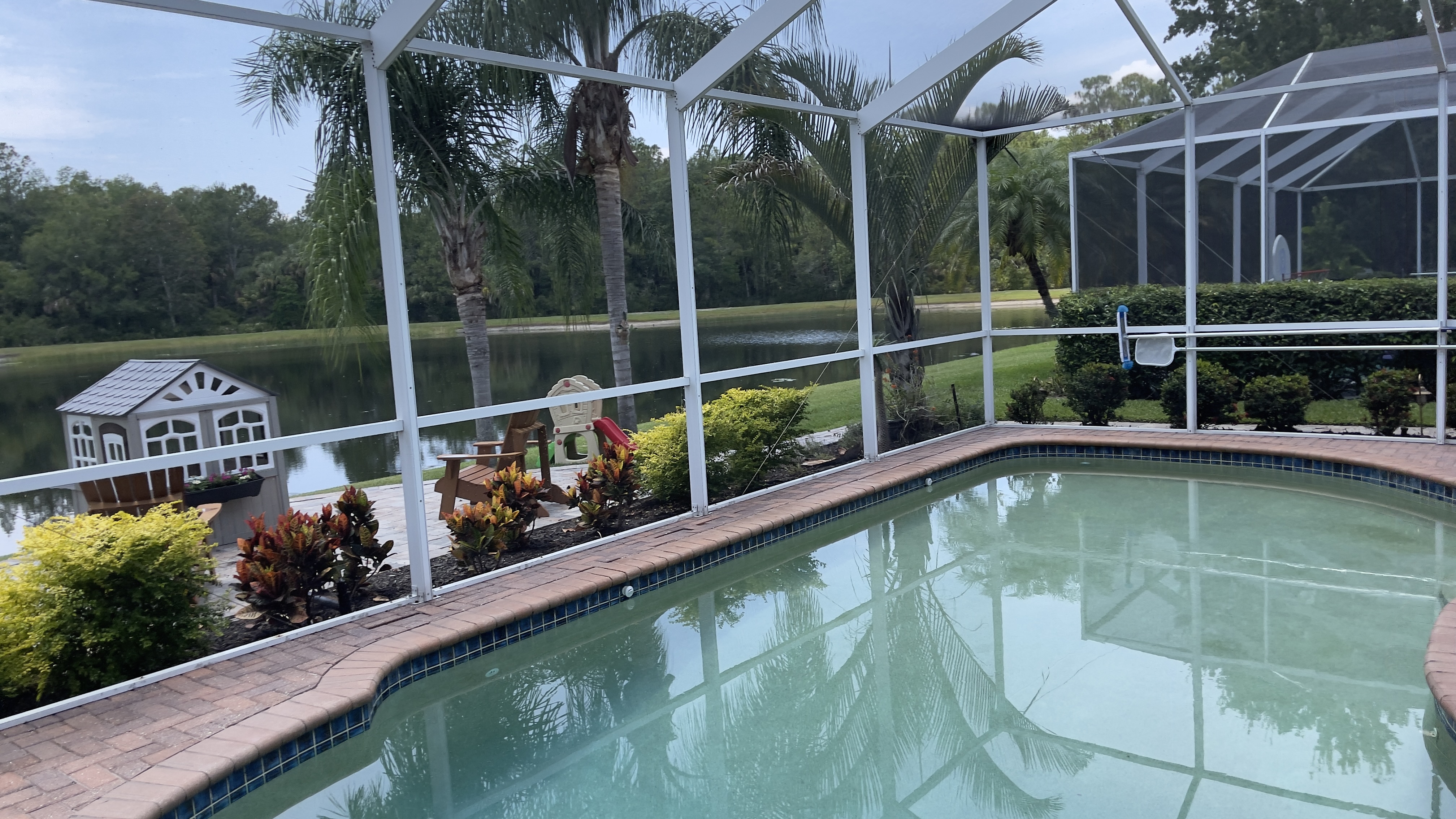 Screened lanai and enclosure structure in Tampa before or during cleaning